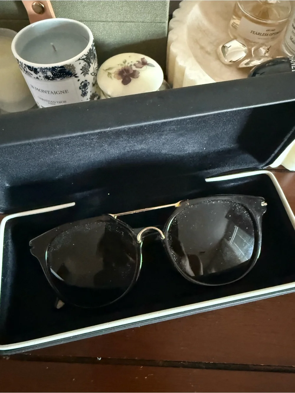 Givenchy Black Round Sunglasses with Gold Bridge